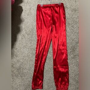 M red joggers. Unsure of brand. Tag says “hey babe M” Purchased from TC Ellis.